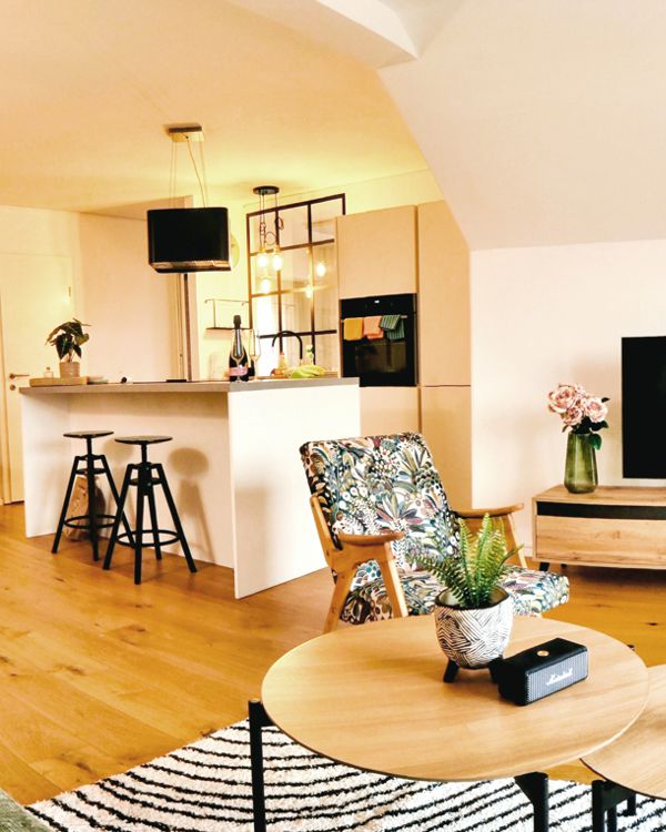Modern living room with stylish furniture and hardwood floors
